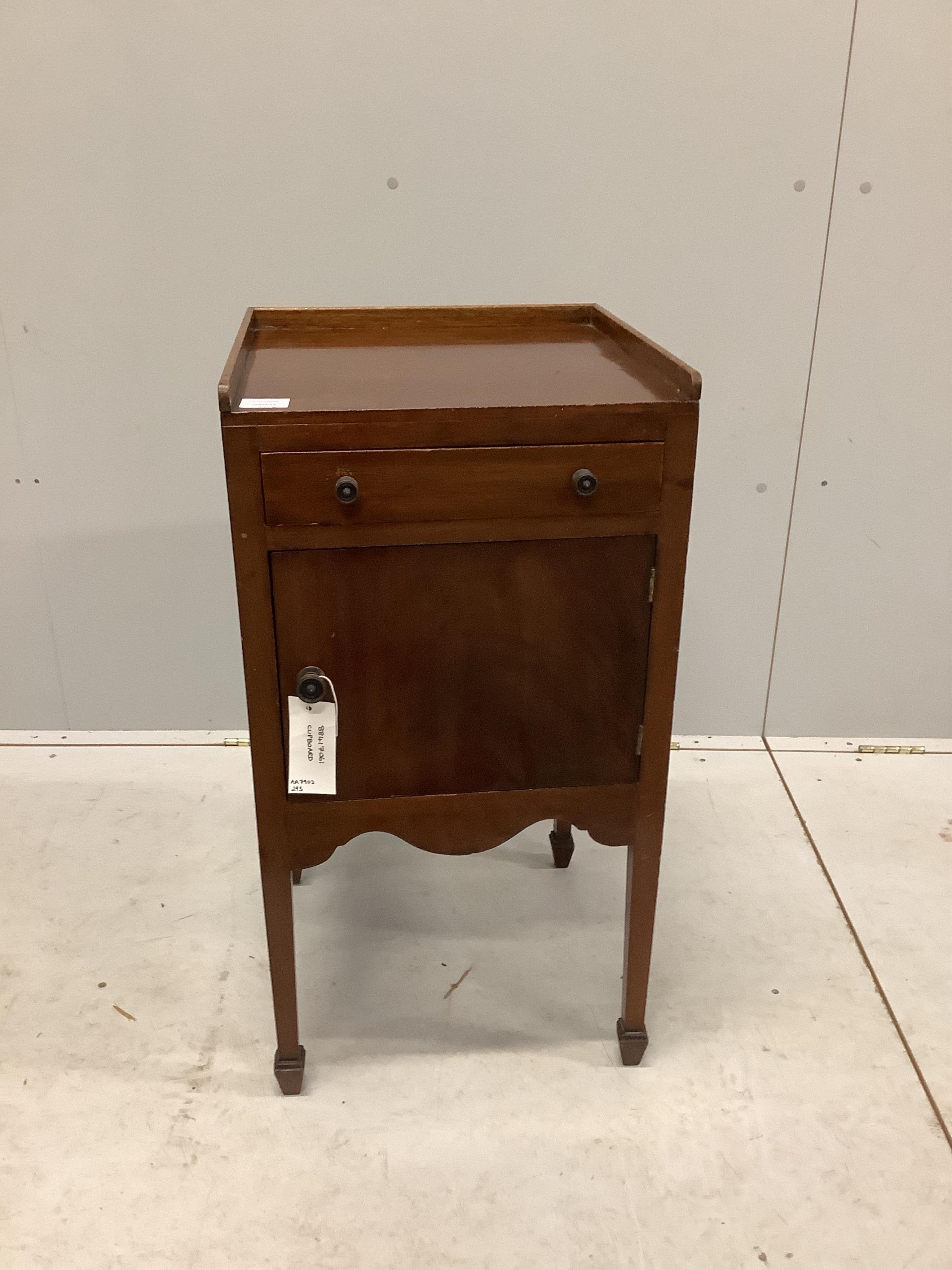 A pair of Edwardian mahogany bedside cabinets, width 41cm, depth 41cm, height 78cm. Condition - poor